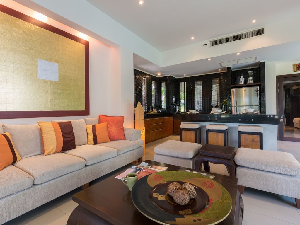 Living Room looking into fully equipped kitchen