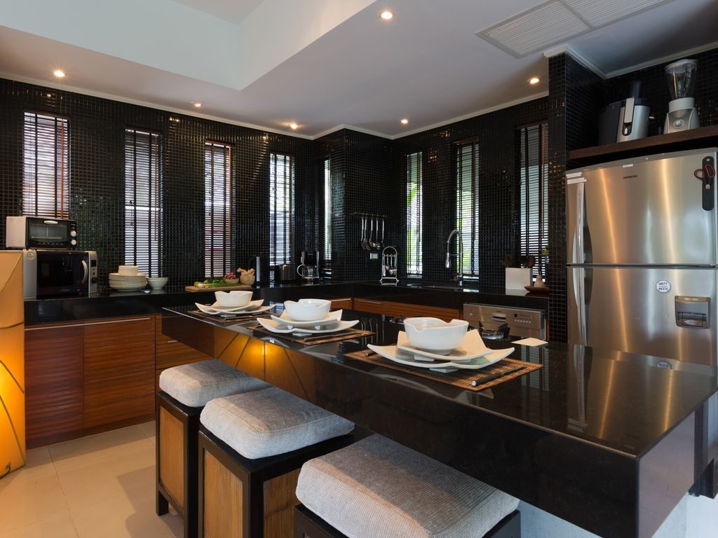 The Kitchen with a plethora of gourmet gadgets.